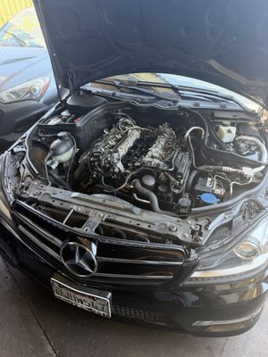 Technician diagnosing a coolant leak at Street Kings Performance & Repair